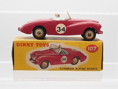 Lot 64 - A DINKY No 107 Sunbeam Alpine Sports Car -...