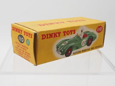 Lot 69 - A DINKY No 110, Aston Martin DB3S in mid green...