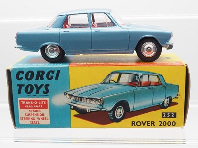 Lot 72 - A CORGI No 252 Rover 2000, steel blue with...