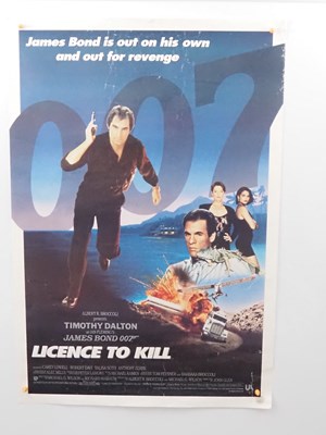 Lot 213 - JAMES BOND: TOMORROW NEVER DIES, LICENSE TO...