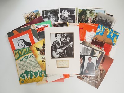 Lot 224 - A box of mixed movie and music memorabilia to...