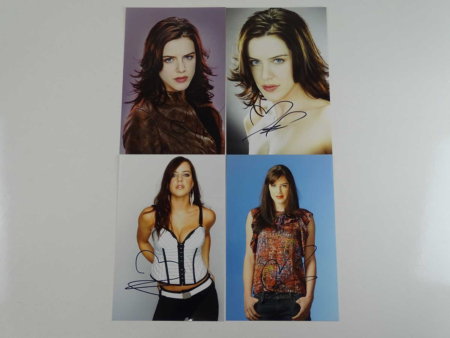 Lot 92 - MICHELLE RYAN - A group of 4 signed publicity...
