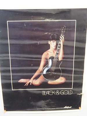 Lot 494 - An advertising poster for Aria Guitars for...