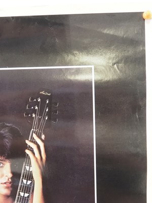 Lot 494 - An advertising poster for Aria Guitars for...