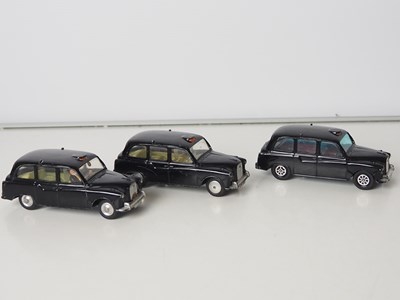 Lot 2 - A group of boxed and unboxed mixed scale Taxis...