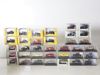 Lot 5 - A group of 1:76 scale (OO gauge) diecast Taxis...