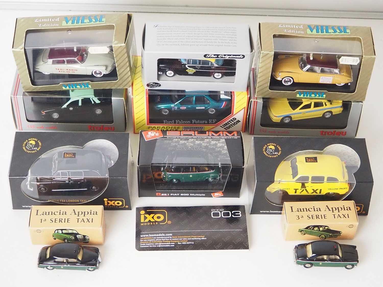 Lot 12 - A group of 1:43 scale assorted taxi cab...