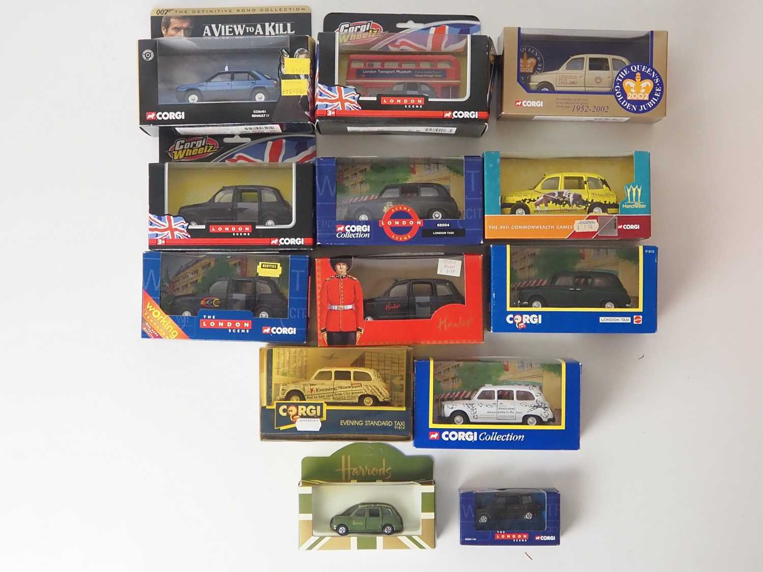 Lot 19 - A group of diecast model Taxis by CORGI - to...