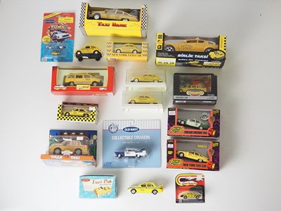 Lot 23 - A group of mixed scale diecast Taxi models, to...