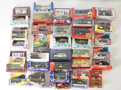 Lot 24 - A large group of mixed scale diecast model...