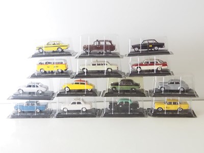 Lot 56 - A group of diecast 1:43 scale model Taxis by...