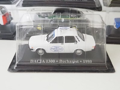 Lot 59 - A group of diecast 1:43 scale model Taxis by...