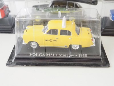 Lot 59 - A group of diecast 1:43 scale model Taxis by...