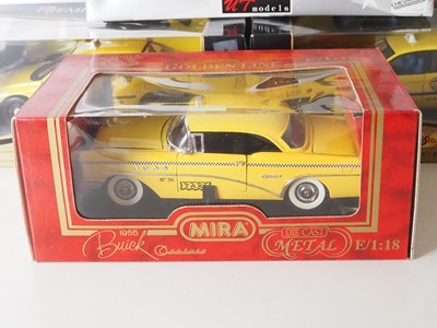 Lot 60 - A group of 1:18 scale diecast model US Taxi...