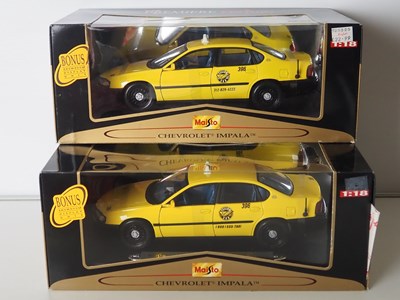 Lot 60 - A group of 1:18 scale diecast model US Taxi...