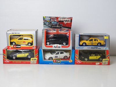 Lot 61 - A group of 1:24 scale diecast model Taxis by...