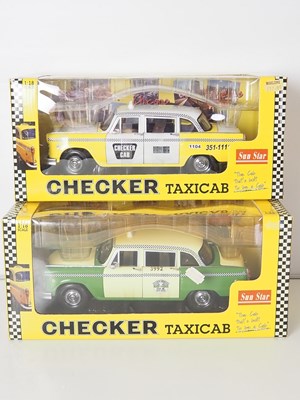 Lot 65 - A pair of 1:18 scale diecast model 1981...