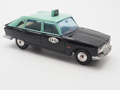 Lot 85 - A pair of 1:43 scale METOSUL diecast taxis,...