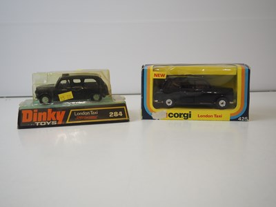 Lot 129 - A group of boxed and unboxed Taxis of various...