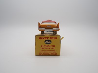Lot 141 - A pair of DINKY TOYS - comprising of a boxed...