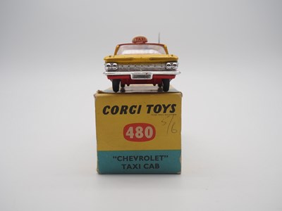 Lot 146 - A CORGI TOYS No 480 Chevrolet Impala Taxi Cab,...
