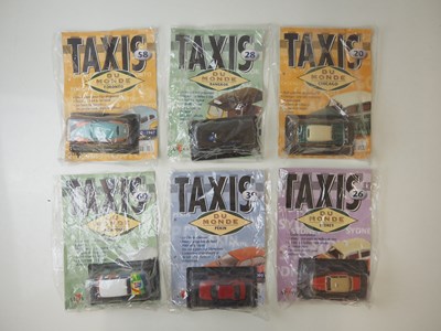 Lot 158 - A large mixed group of diecast Taxis to...