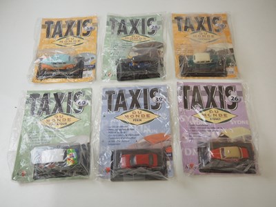 Lot 158 - A large mixed group of diecast Taxis to...