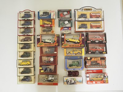 Lot 160 - A large group of assorted diecast Taxis, to...