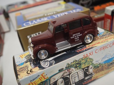 Lot 160 - A large group of assorted diecast Taxis, to...