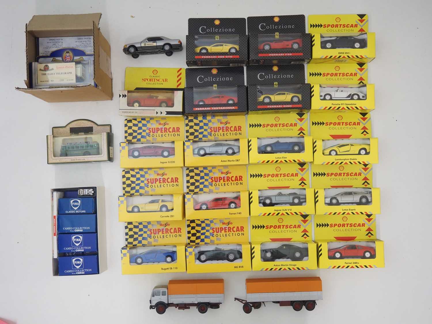 Lot 168 - A group of mixed boxed diecast cars, vans