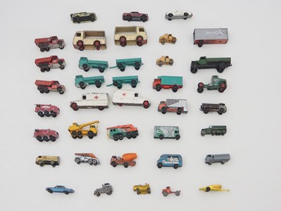 Lot 175 - A group of playworn diecast cars, vans and...