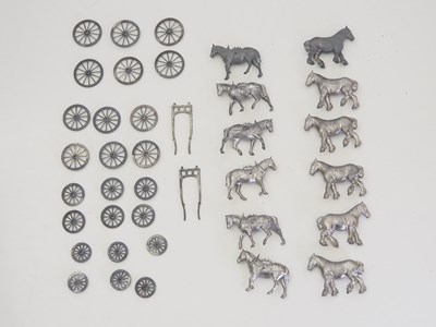 Lot 197 - A group of unpainted BRITAINS lead cart horses...