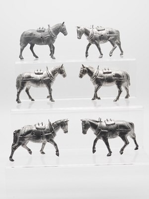 Lot 197 - A group of unpainted BRITAINS lead cart horses...
