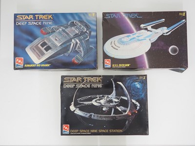 Lot 211 - A group of AMT unbuilt plastic kits from the...