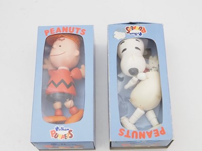 Lot 223 - A pair of SNOOPY related PELHAM PUPPETS...