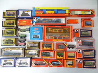 Lot 601 - A quantity of OO Gauge freight wagons by...