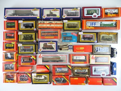 Lot 602 - A quantity of OO Gauge freight wagons by...