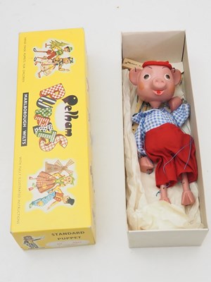 Lot 255 - A vintage PELHAM PUPPET SS9 Pinky in yellow...