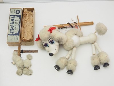 Lot 259 - A large 24" PELHAM PUPPET display white poodle...