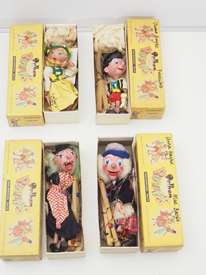 Lot 264 - A group of mixed PELHAM PUPPETS all in yellow...