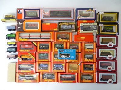 Lot 604 - A quantity of OO Gauge freight wagons by...