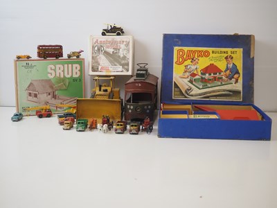 Lot 279 - A mixed lot of vintage toys, cars, trams etc...