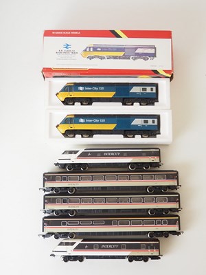Lot 353 - A boxed and unboxed HORNBY OO gauge group,...