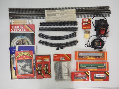Lot 489 - A quantity of HORNBY OO gauge rolling stock,...