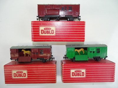 Lot 645 - A trio of HORNBY DUBLO 2-rail horse boxes -...