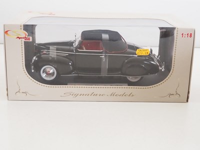 Lot 33 - A group of 1:18 scale diecast cars, comprising...