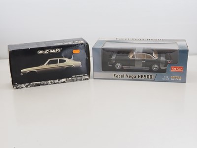 Lot 37 - A pair of 1:18 scale diecast cars, comprising...