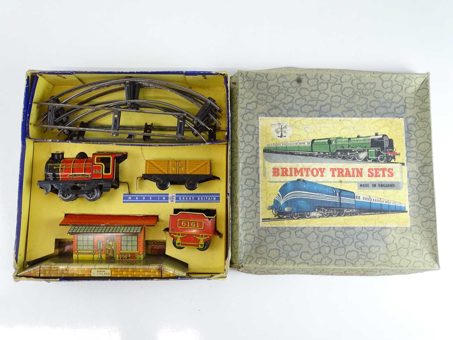 Lot 106 - A BRIMTOY O gauge clockwork tinplate train