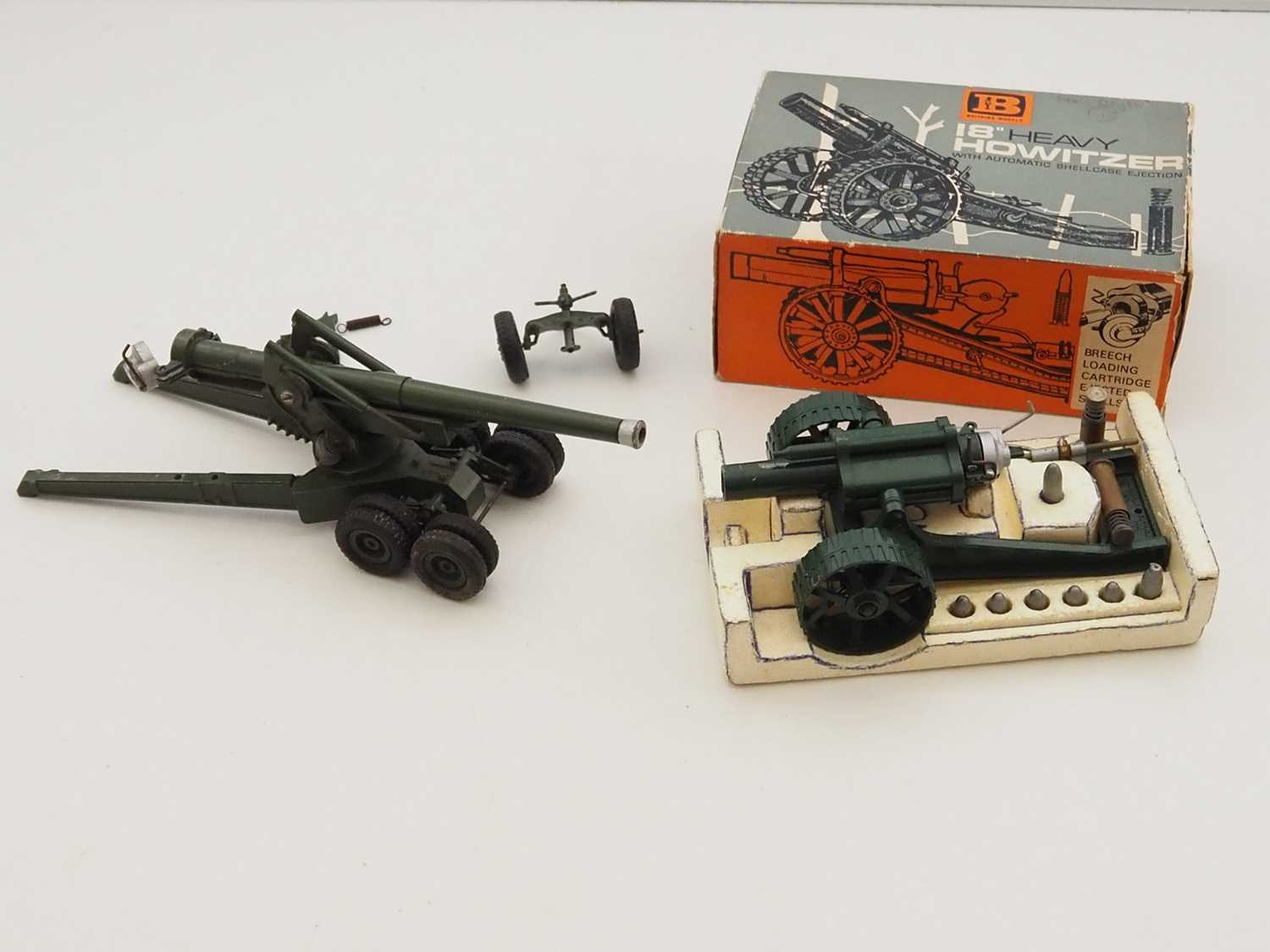 Lot 83 - A pair of BRITAINS military guns to include an...