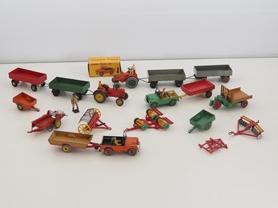 Lot 85 - A group of diecast farm vehicles and equipment...